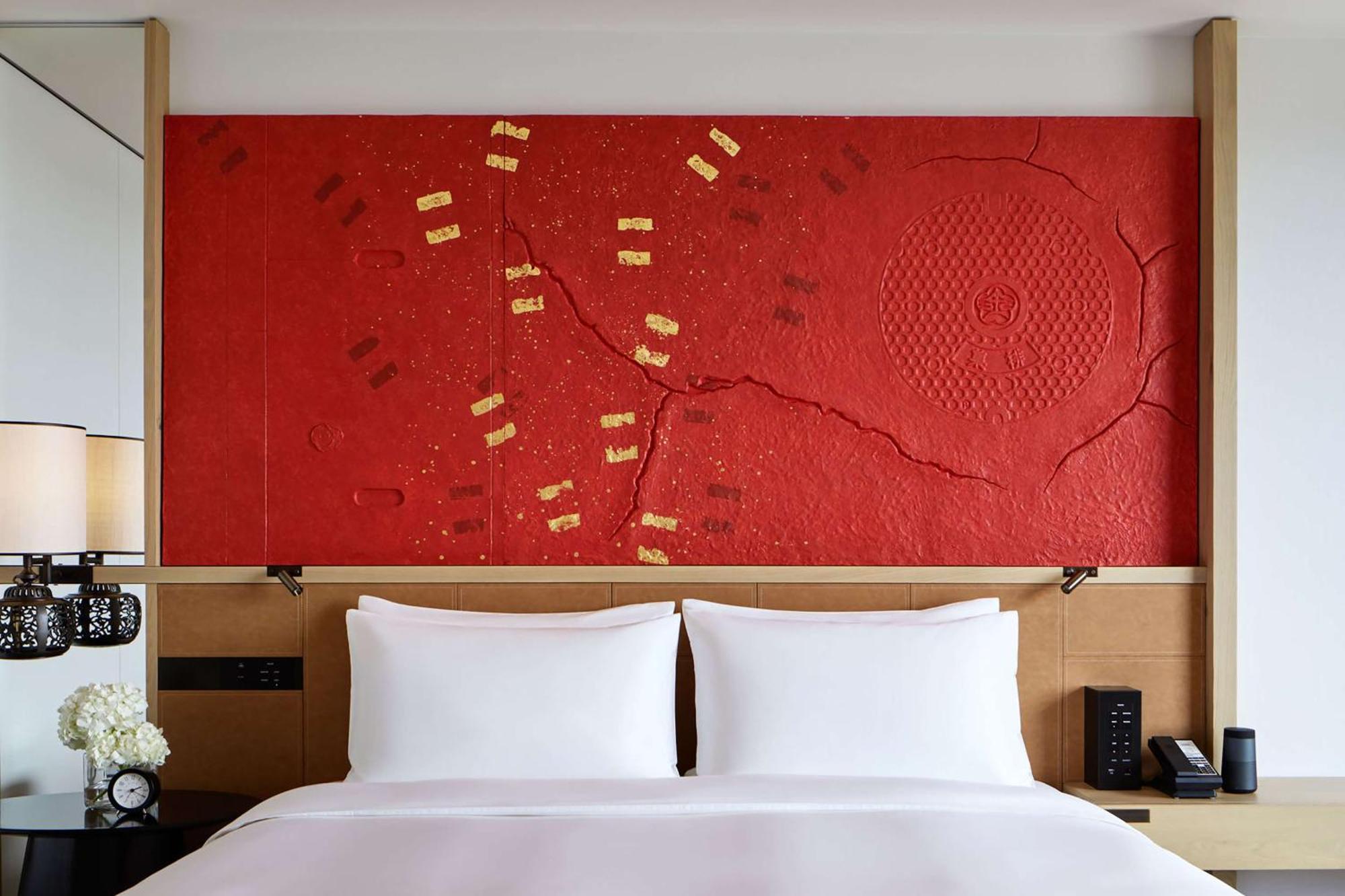 Hyatt Centric Канадзава Екстер'єр фото A bed with a headboard